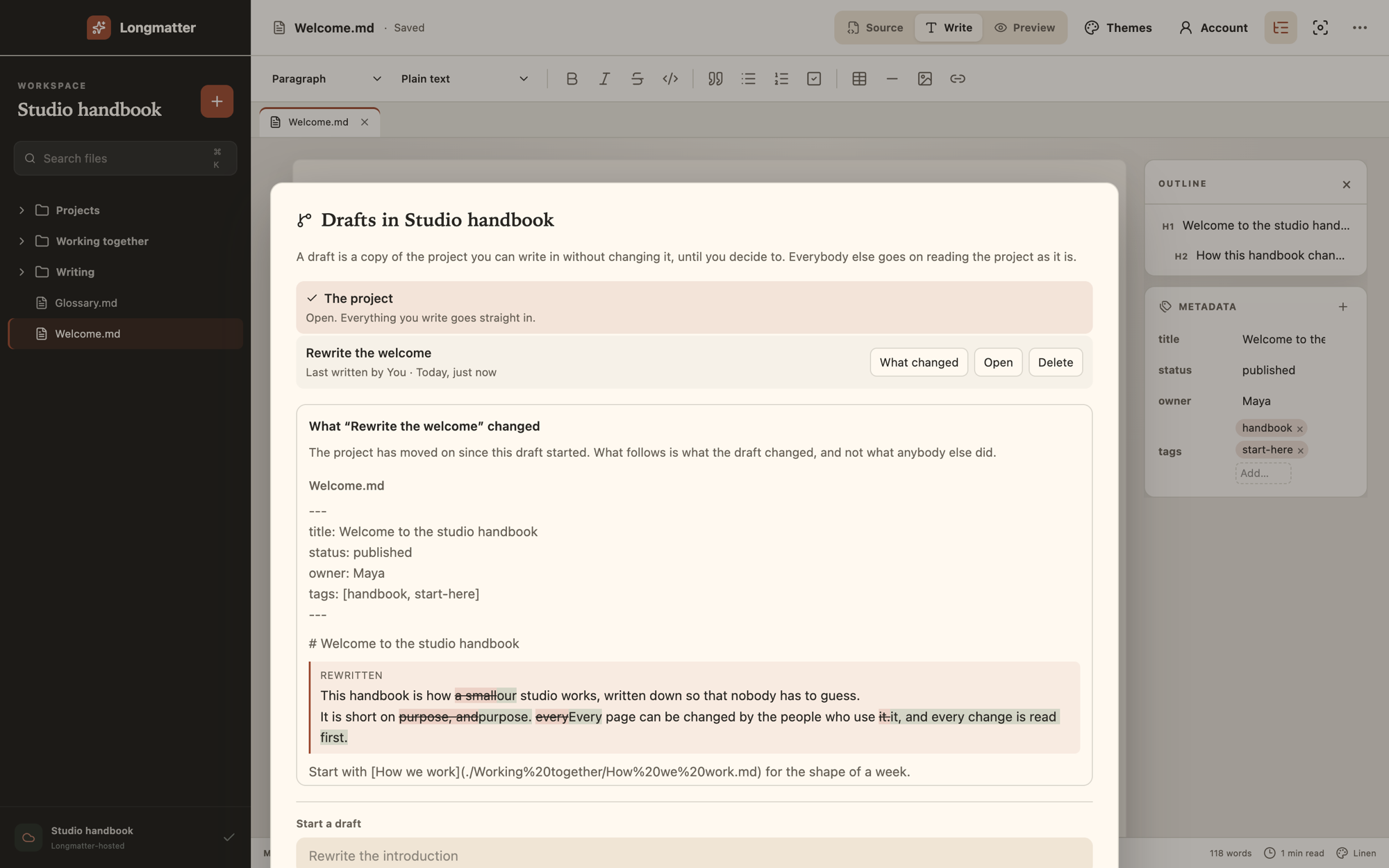 The Drafts dialog showing what the draft changed in Welcome.md, with the removed words struck through and the new words highlighted.